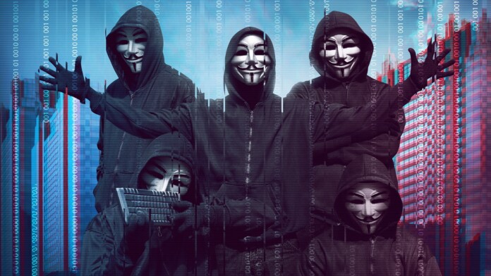 Hackers in masks with keyboard