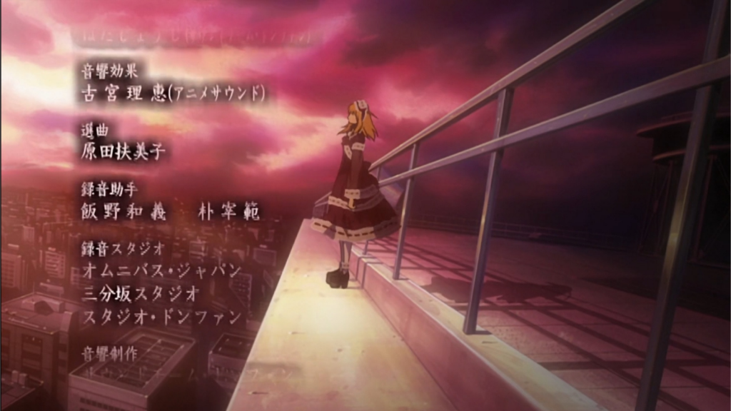 Misa Amane standing on the ledge of a building