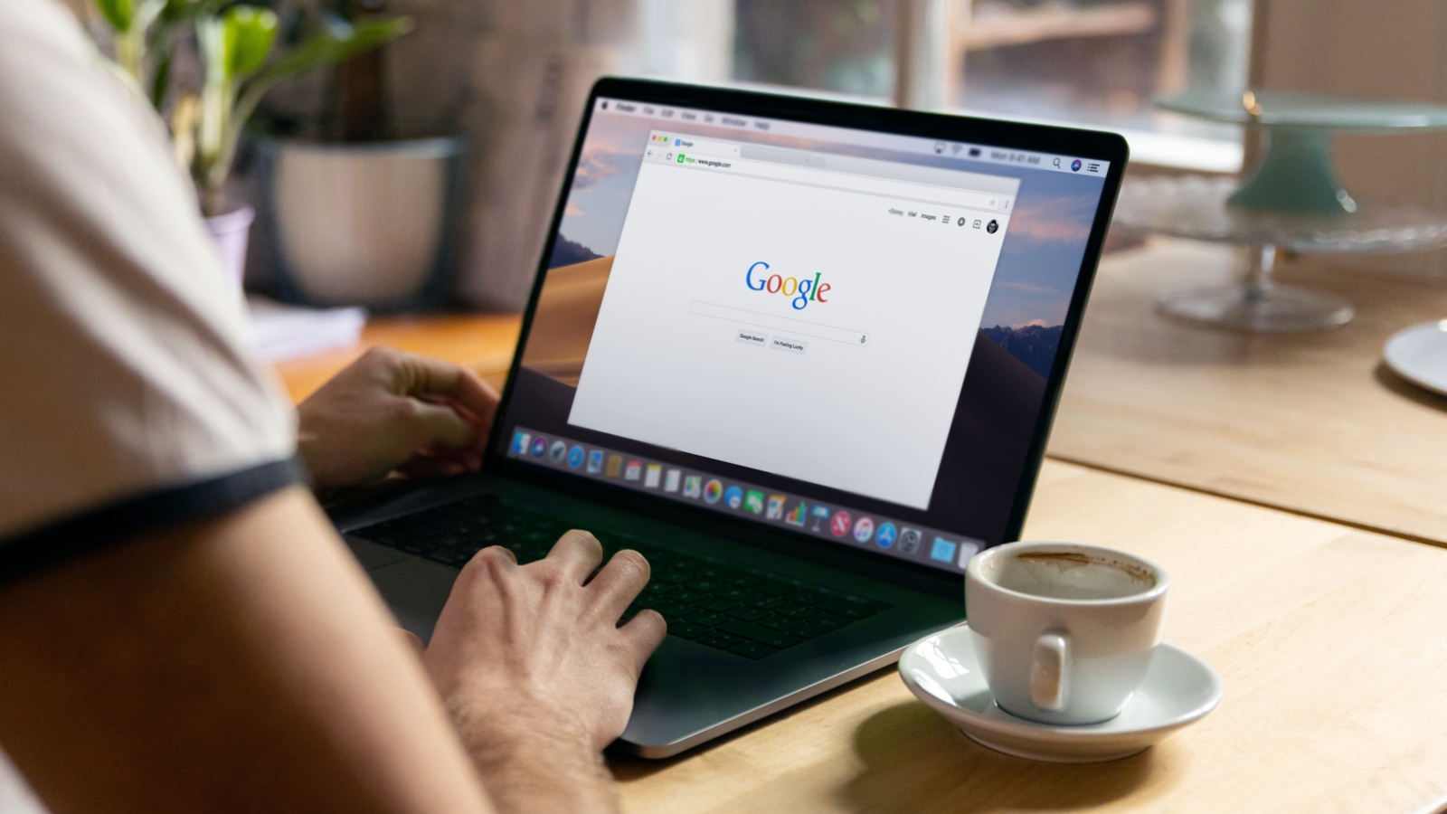 Chrome Browser Open on a Laptop Placed on a Desk