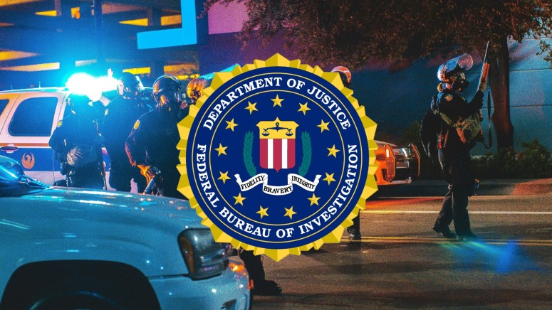 FBI Logo with Policemen in the Background