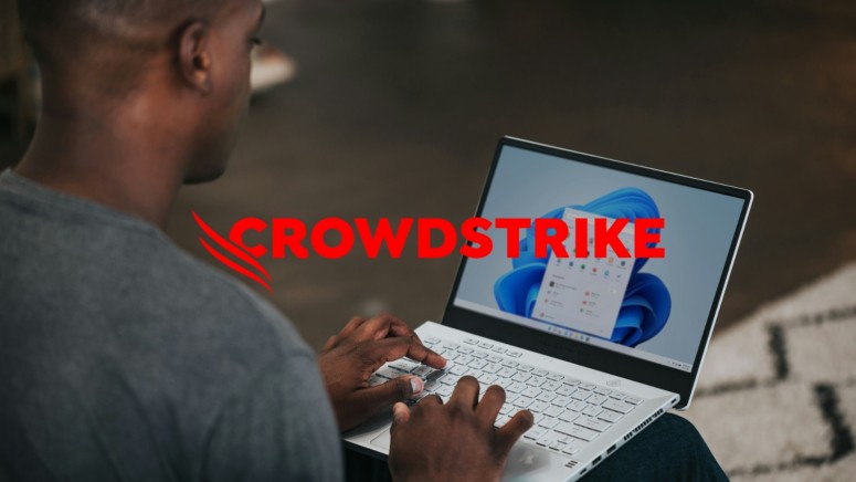 Crowdstrike Logo with a Windows PC in the Background