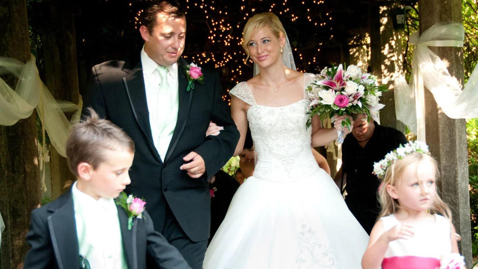 Jason and Molly Corbett, along with Jason's children, on their wedding day