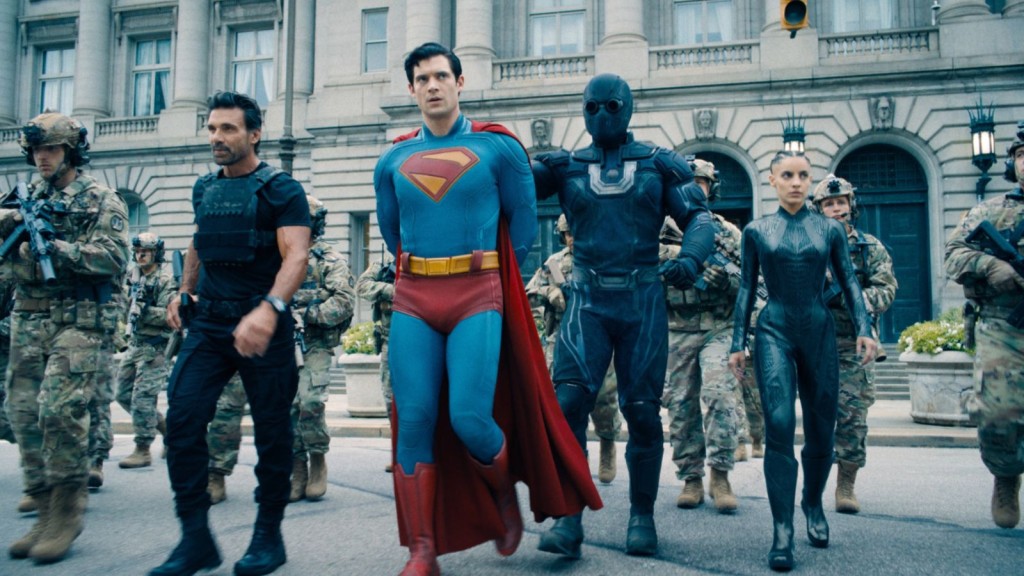 Superman being arrested by Rick Flag, Ultraman, and The Engineer