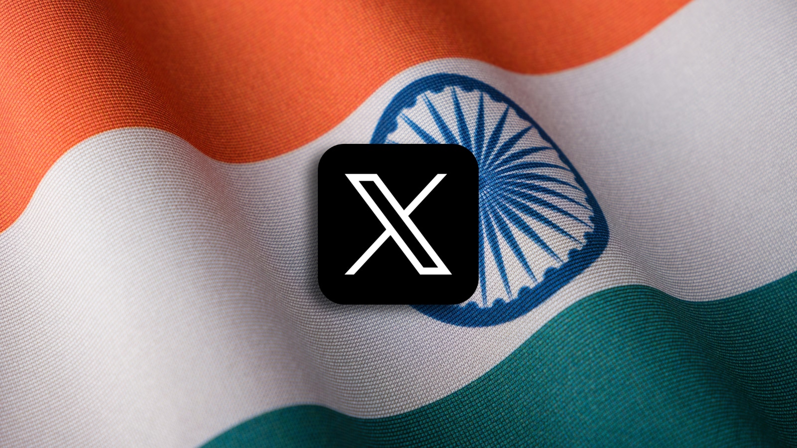 The icon of the X social media network with Indian flag in the background.